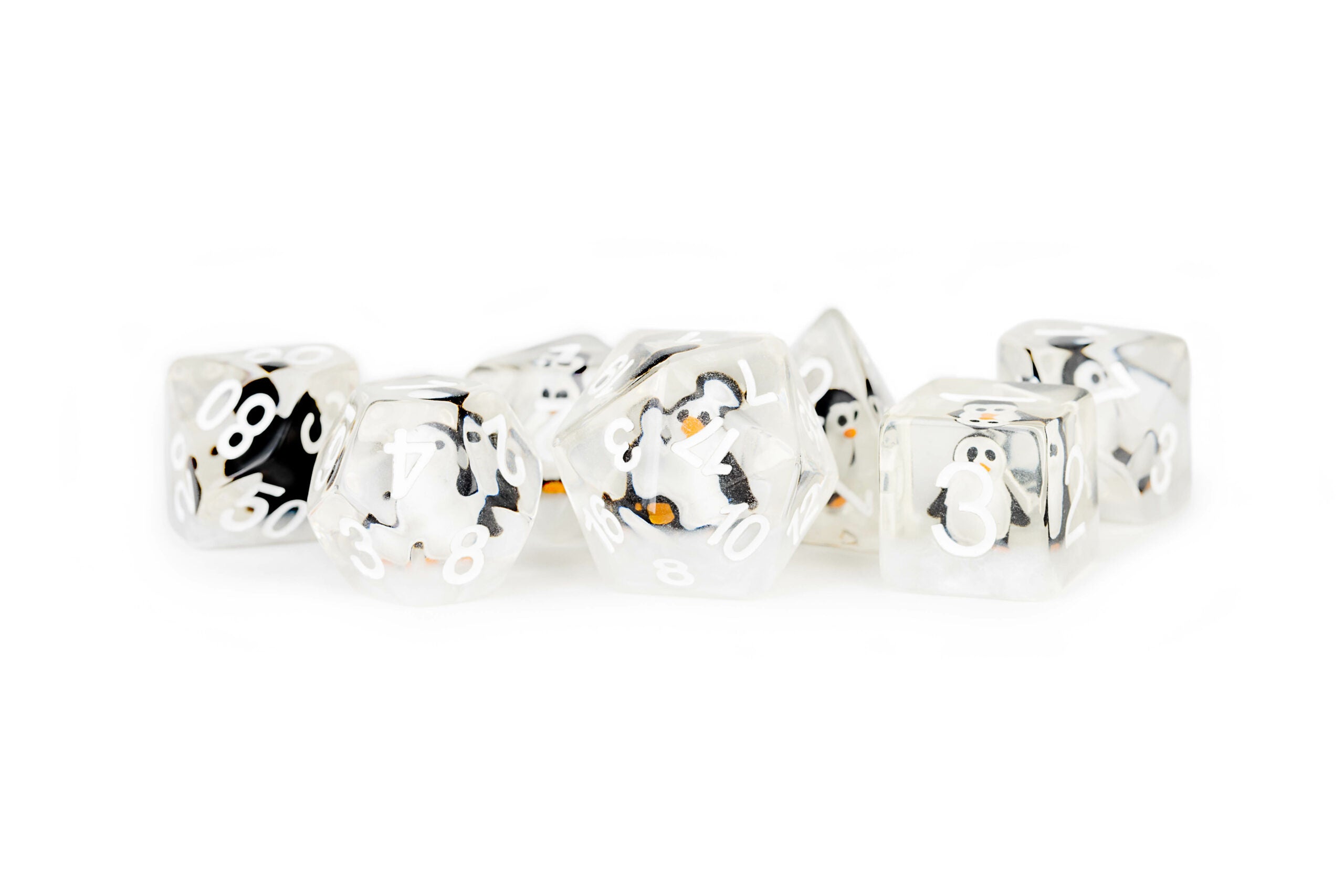 Penguin figures in clear 16mm Resin Poly Dice Set