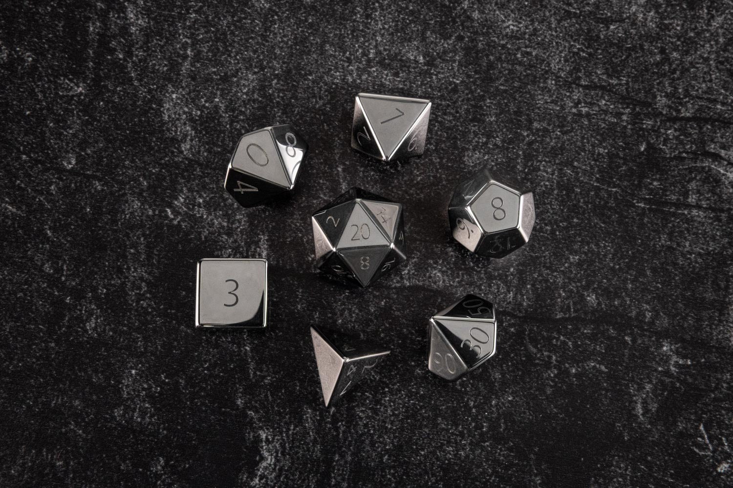 16mm Stone Poly Dice Set: Engraved Hematite