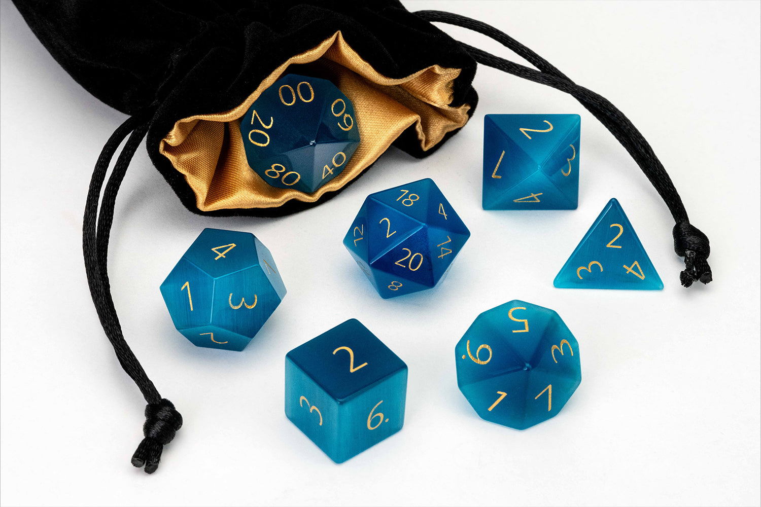 Mystic Mines 16mm Stone Poly Dice Set: Engraved Cat's Eye Aquamarine
