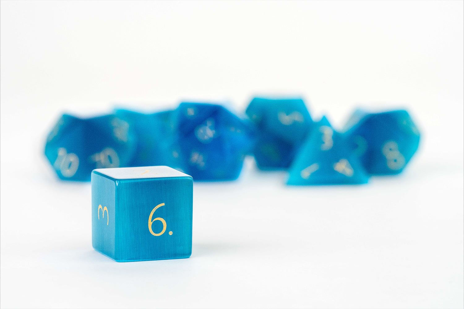 Mystic Mines 16mm Stone Poly Dice Set: Engraved Cat's Eye Aquamarine