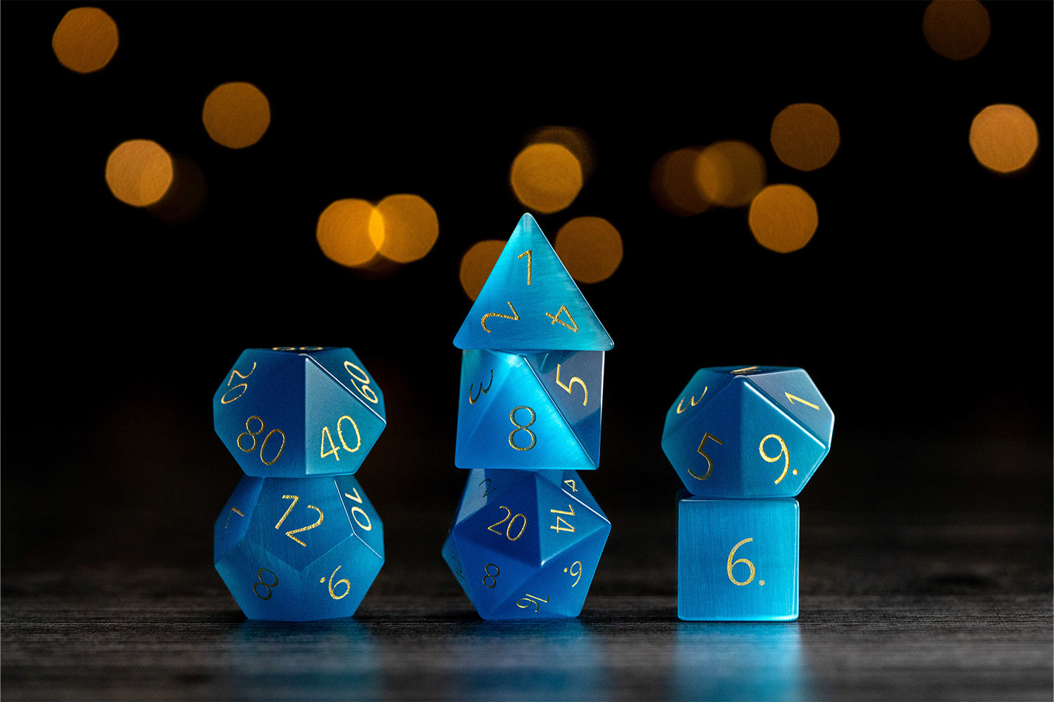 Mystic Mines 16mm Stone Poly Dice Set: Engraved Cat's Eye Aquamarine